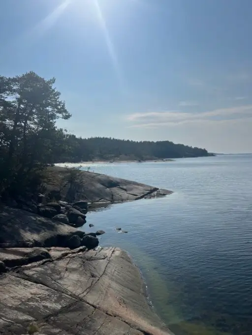Coastal hiking trail through forest on Yxlan Island, Stockholm Archipelago Trail