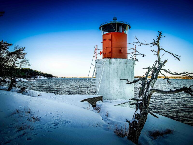 Lighthouse covered in snow SAT Yxlan